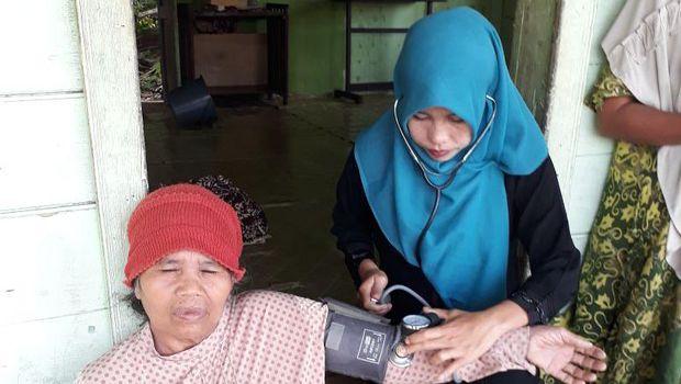 Kisah Bidan Butet Nasution di Kecamatan Rambah Rokan Hulu, Mengabdi ke Negara di Desa nan Jauh dari Kebisingan Kota tanpa Digaji Sepeser pun