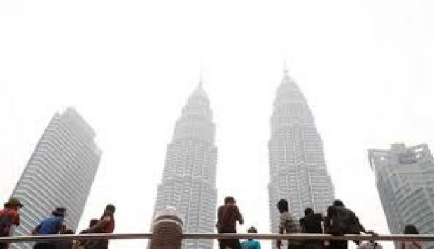 Ditiup Angin Kencang, Asap dari Riau Mulai Selimuti Udara Singapura dan Malaysia