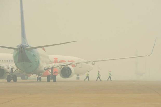 Kabut Asap di Riau Ganggu Penerbangan, Masyarakat Diminta Pilih Keberangkatan setelah Jam 9 Pagi