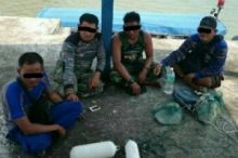 oknum-polair-polda-riau-yang-diduga-memeras-nelayan-bersama-3-warga-sipil-masih-ditahan-di-malaysia