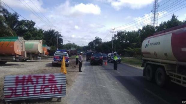 Dua Mobil Tengki Tabrakan hingga Minyak CPO Tumpah di Jalintim Km 33 Bandarseikijang , Begini Penjelasan Polres Pelalawan