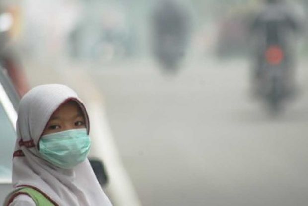 Akibat Kabut Asap, Anak-anak Riau Terancam Mengalami Penurunan Kecerdasan